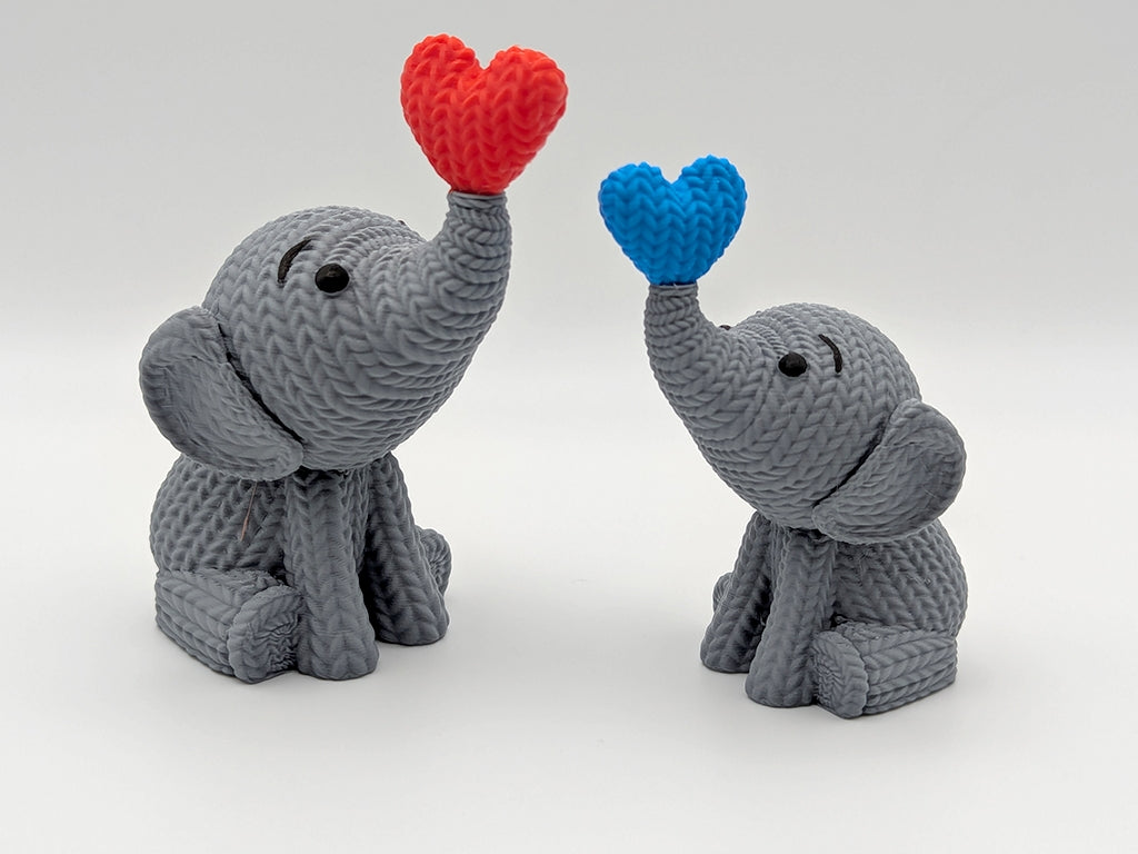 Knitted Elephant Blowing a Heart Bubble